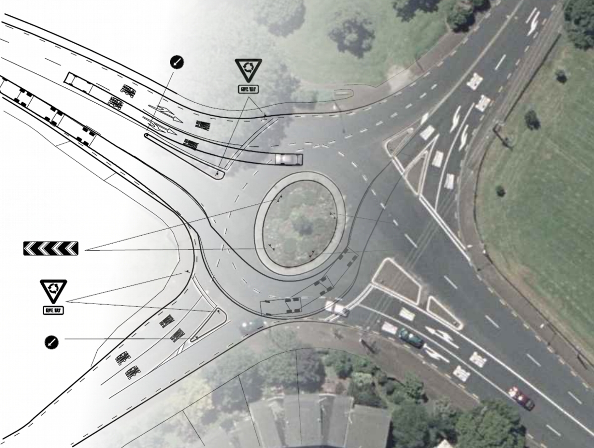 Roundabout design drawn over an aerial photograph, with vehicle paths and signs marked