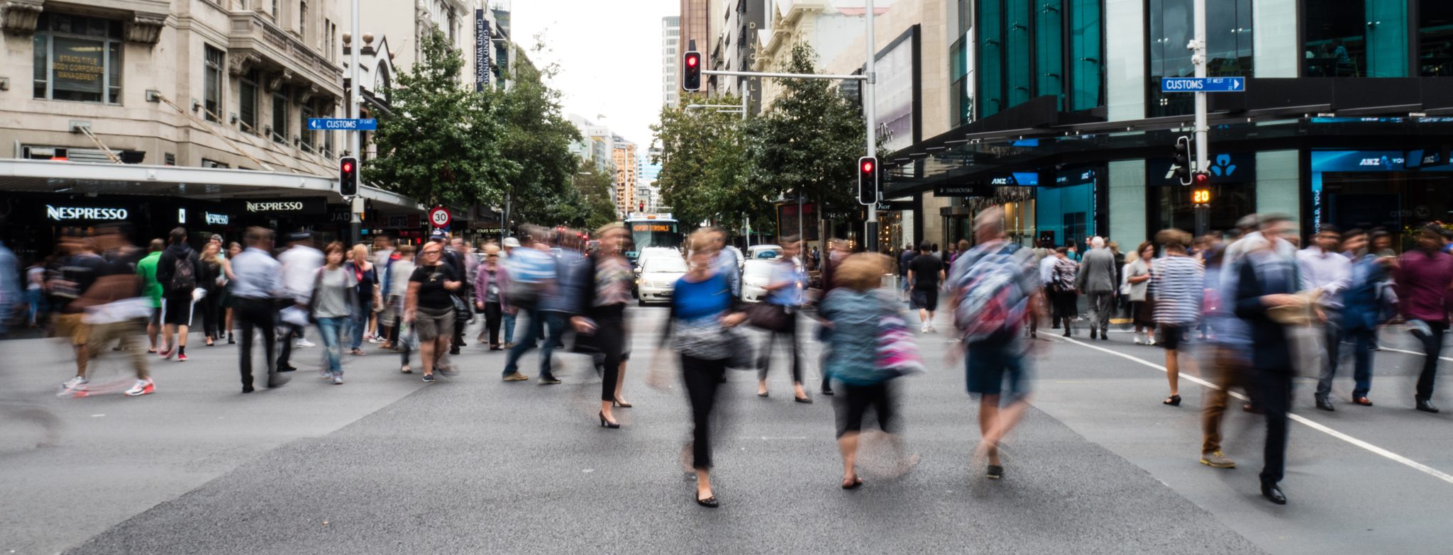 pedestrians crossing an intersection in Auckland